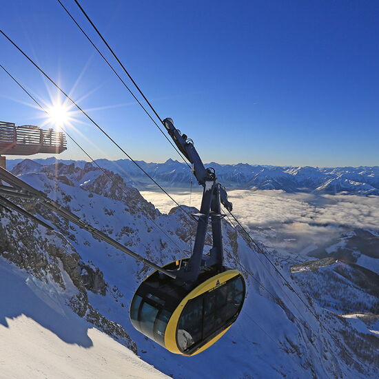 Gondola ride to the Dachstein with a view of the Ennstal